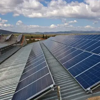 A view of solar panels on the roof generating clean energy.
