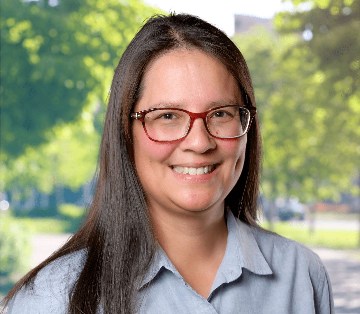 Headshot of woman wearing glasses.